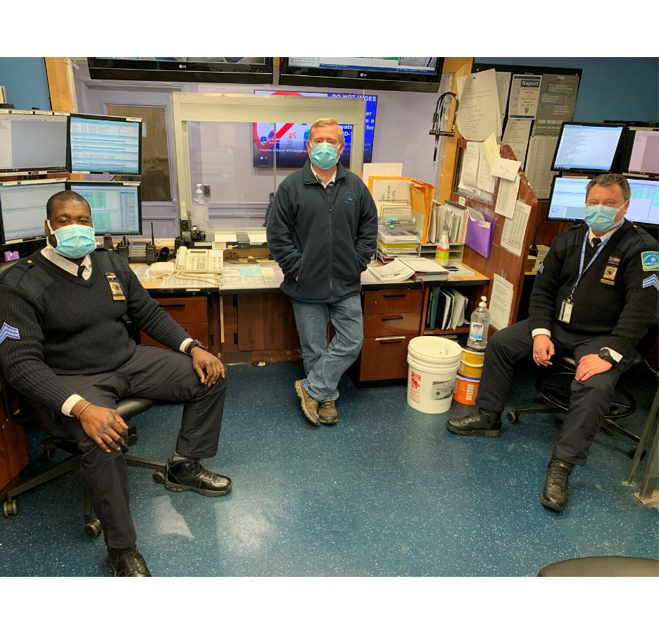 The Morningside campus Public Safety team members sit in an office with masks on